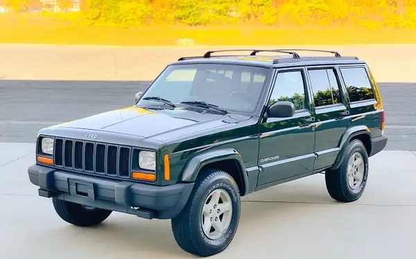 Green cherokee by autosales by autosales