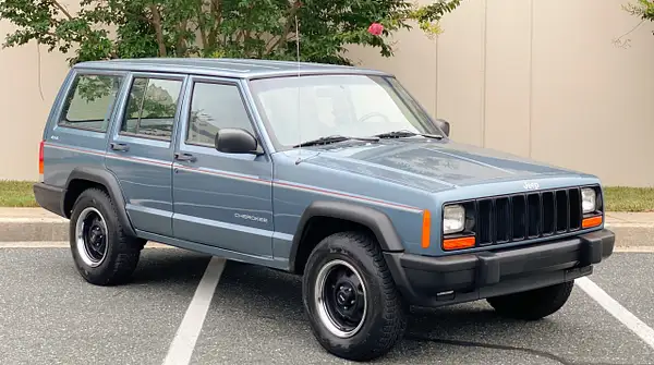 Light blue cherokee by autosales by autosales