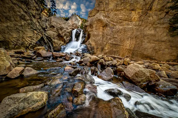 Rocky Mountain Waterfall by Clifton Haley