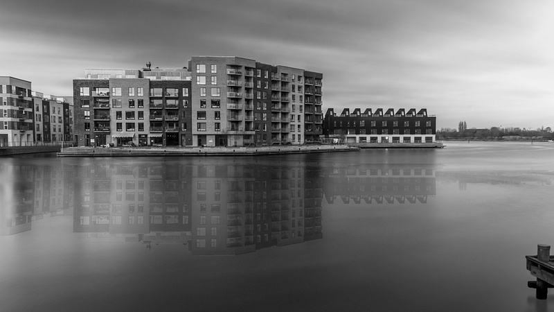 Copenhagen black & white houses by the water reflection