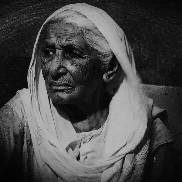 grandmother-dramatic-portrait-bordeaux by Muzafar Sujra