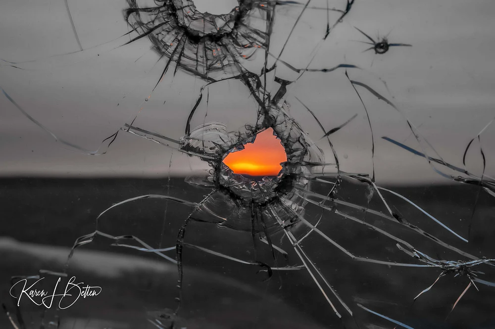 Vivid Horizon Framed by Shattered Glass