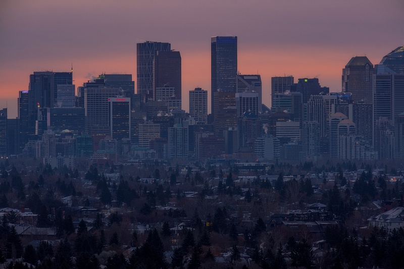 Close up view of downtown Calgary Core - orange skies
