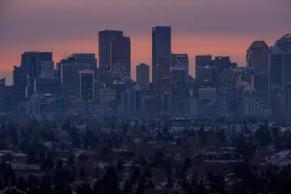 Close up view of downtown Calgary Core - orange skies by...