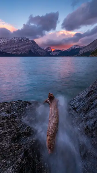 Water Splashing Log in Lake with Sunrise by Yves Gagnon