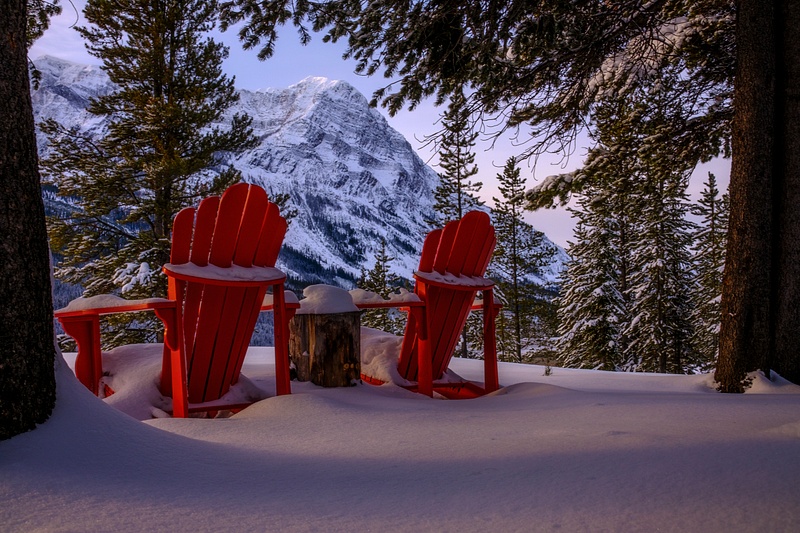 Winter Scene Two Red Chair Facing Storm Mountain, Banff National Park, Alberta Canada_