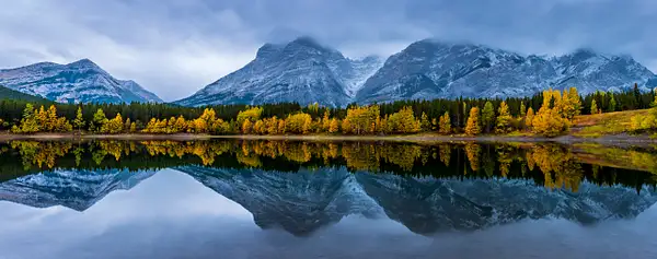 Wedge Pond  with Mount Kidd During Cold Fall Morning by...