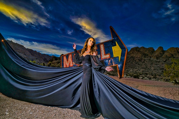 Model in black gown at Nelson Ghost Town , NV in front of Motel  sign by Rick Friedman - Models - Rick Friedman Photography 