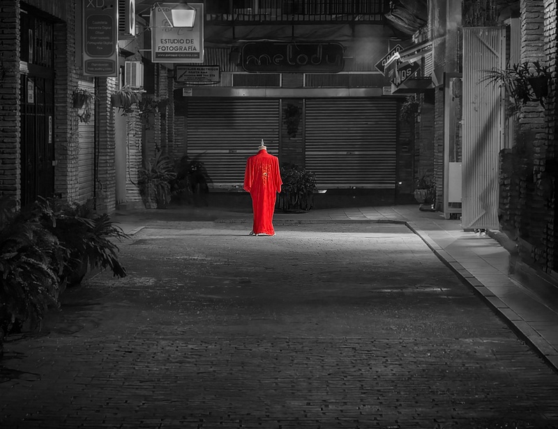 Red dress in  alley, Cordoba, Spain