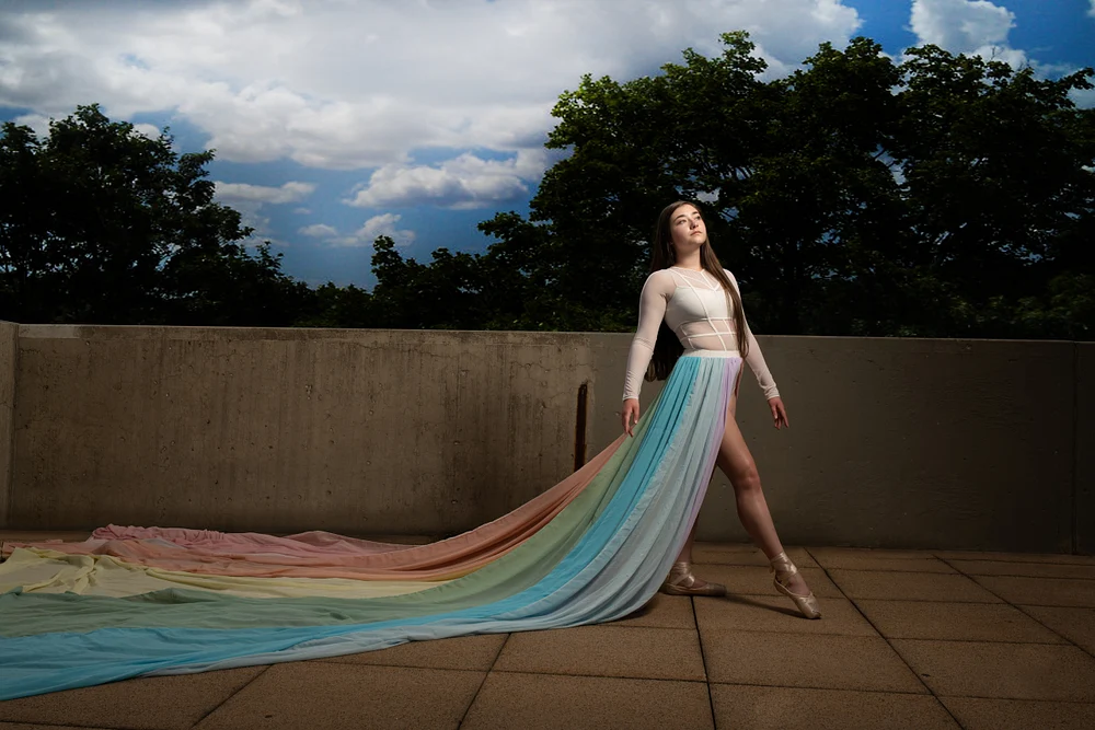 Elegant Ballet Dancer in Colorful Flowing Skirt