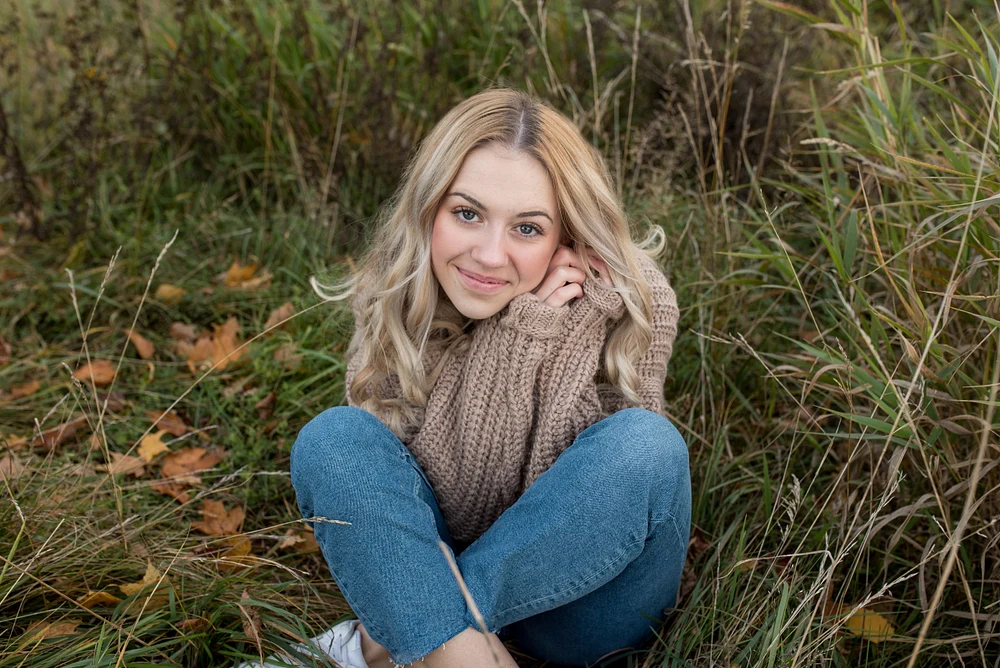 Natural Senior Portrait in Autumn Grass
