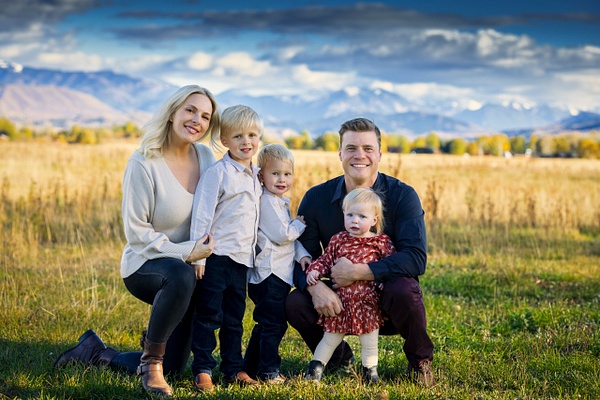 Young family in field portrait - Flo McCall Photography 