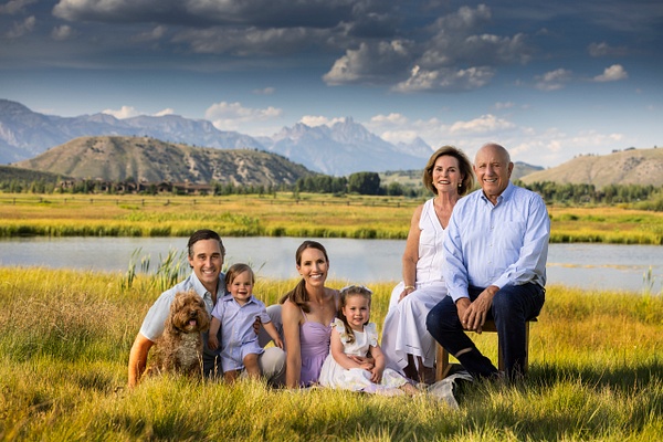 Family portrait with grandparent, pond and teton view - Flo McCall Photography