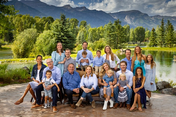 Extended family portrait with pond and mountains - Flo McCall Photography 