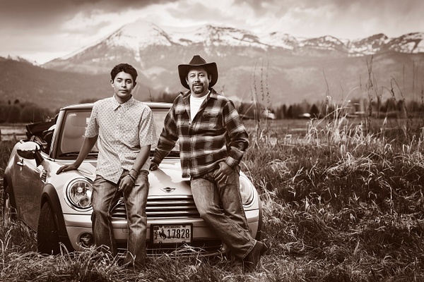 father son on car with mountains - Flo McCall Photography 