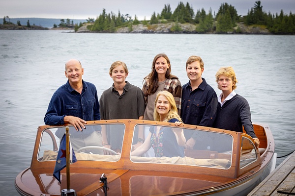 Family portrait in boat - Flo McCall Photography