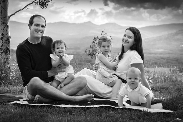Black &amp; white portrait on grass with mountains - Flo McCall Photography 