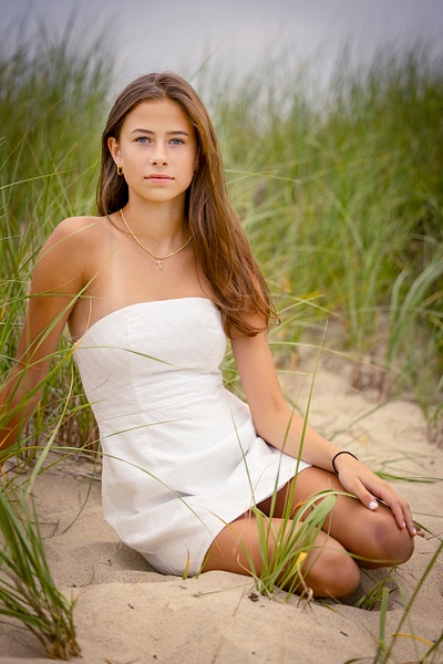 girl sitting in tall grass - Flo McCall Photography 