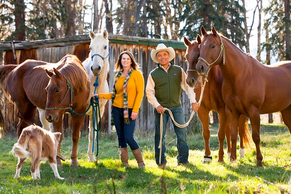 husband &amp; wife with horses - Flo McCall Photography