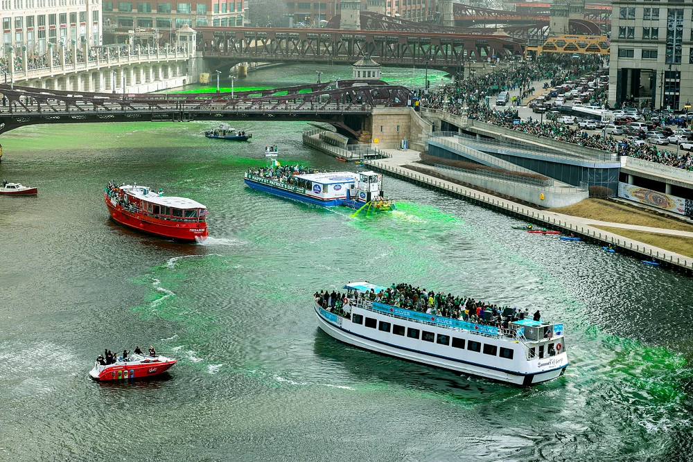 Chicago River St. Patrick's Day Celebration with Green Water and Festive Boats