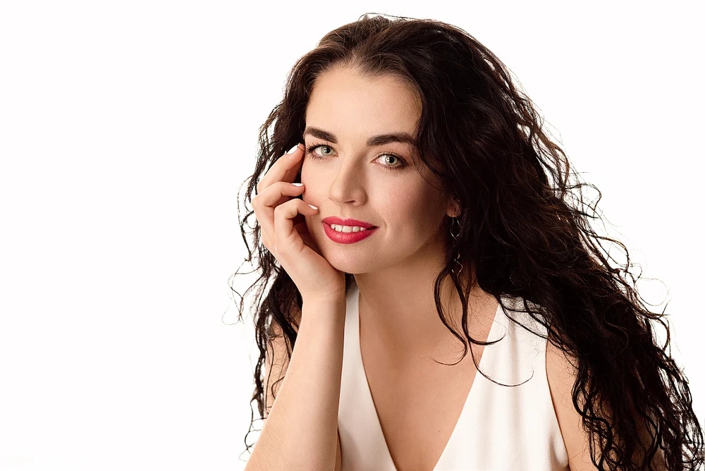 Elegant Portrait of a Woman with Long Curly Hair