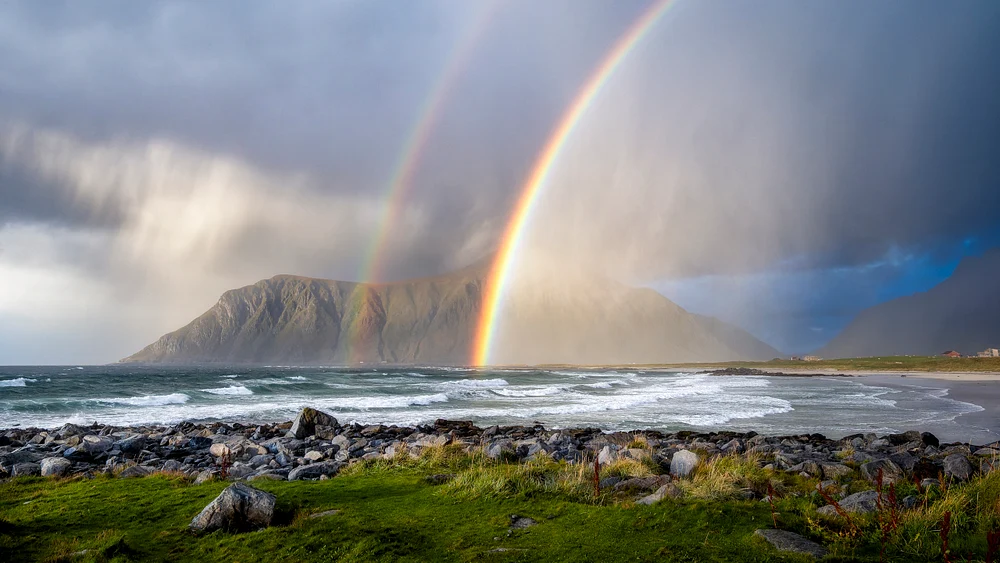 Majestic Rainbows Over Lofoten's Serene Beach