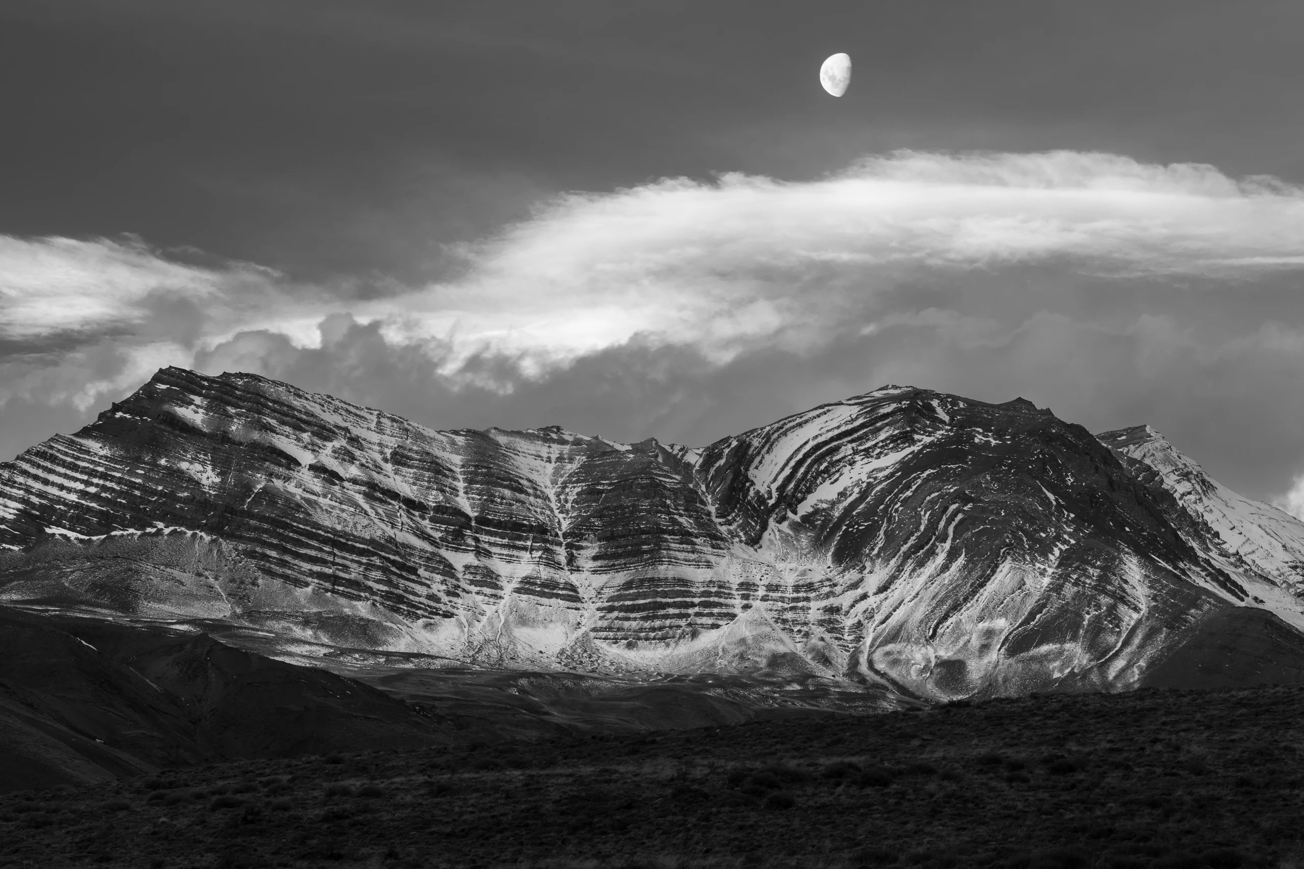 Ethereal Moonrise Over Patagonia's Striated Peaks