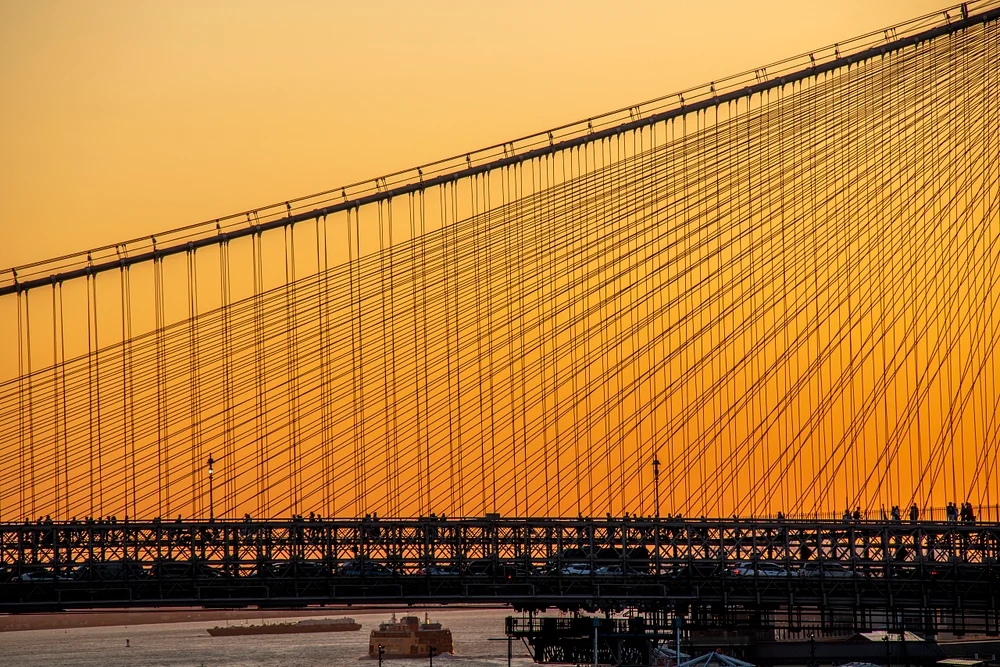 Stunning Sunset Over Brooklyn Bridge: Autumn Evening in New York