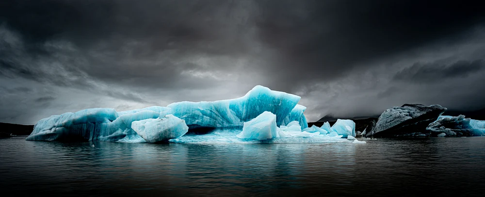 Stunning Black Iceberg at Fjallsárlón Lagoon, Iceland