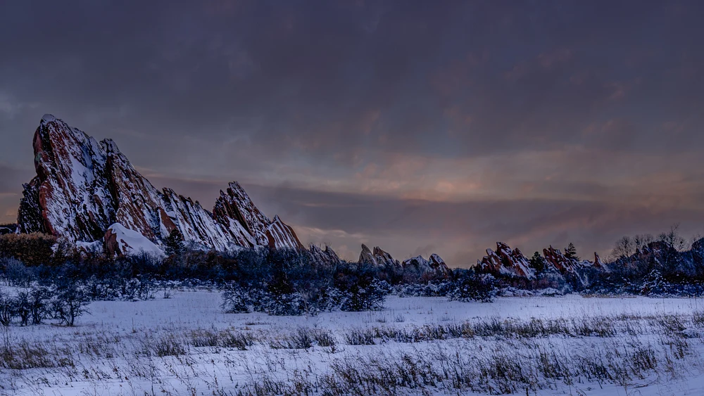 Snowy Winter Sunrise at Roxborough State Park's Red Rock Formations