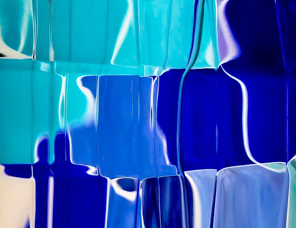 Abstract turquoise and cobalt panels with white reflective edges create a fluid glasslike geometric composition