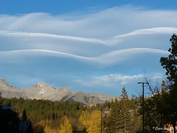 Lenticular Clouds near Banff, Alberta Canada by Ernie...