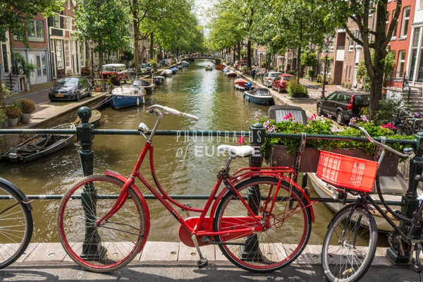 Red-bicycle-on-canal-bridge-Amsterdam-Netherlands - Photographs of Europe 