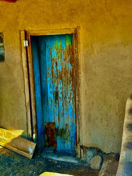 Door at Taos Pueblo by Donna Elliot
