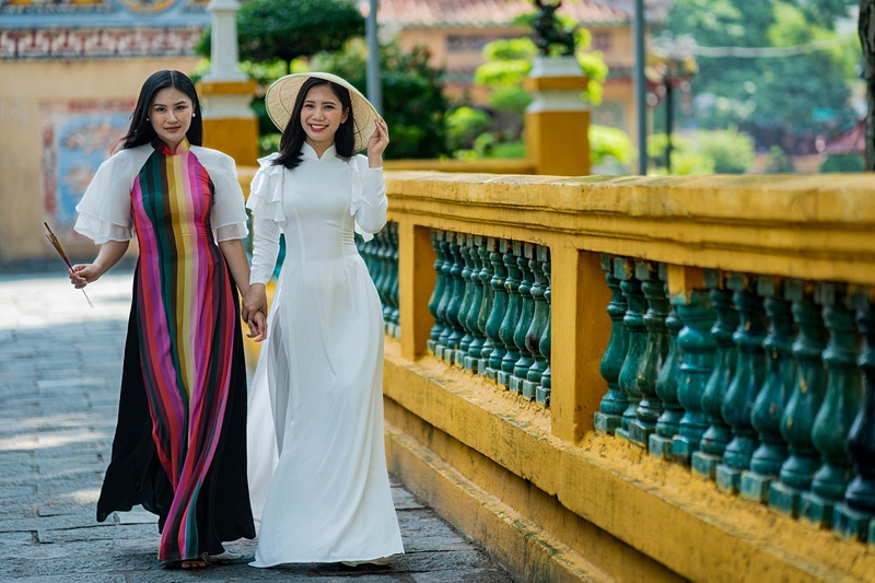 Ladies wearing ao dai, the traditional dress of Vietnamese women, Ho Chi Minh City