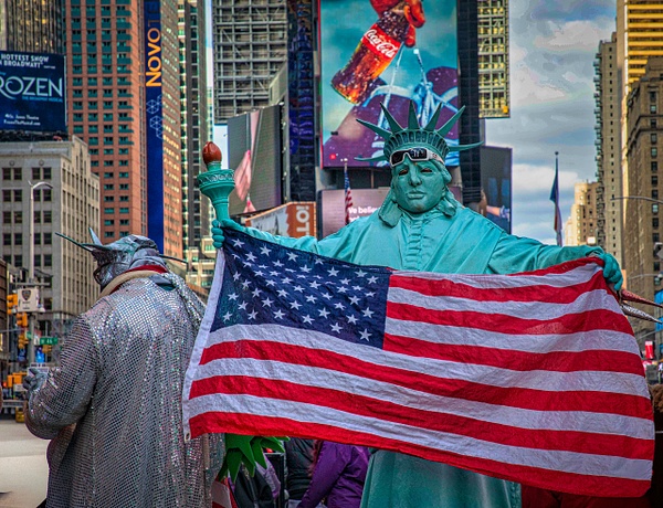Statue of Liberty Performer Holding American Flag in Times Square - New York City - Hank Bishop Photography