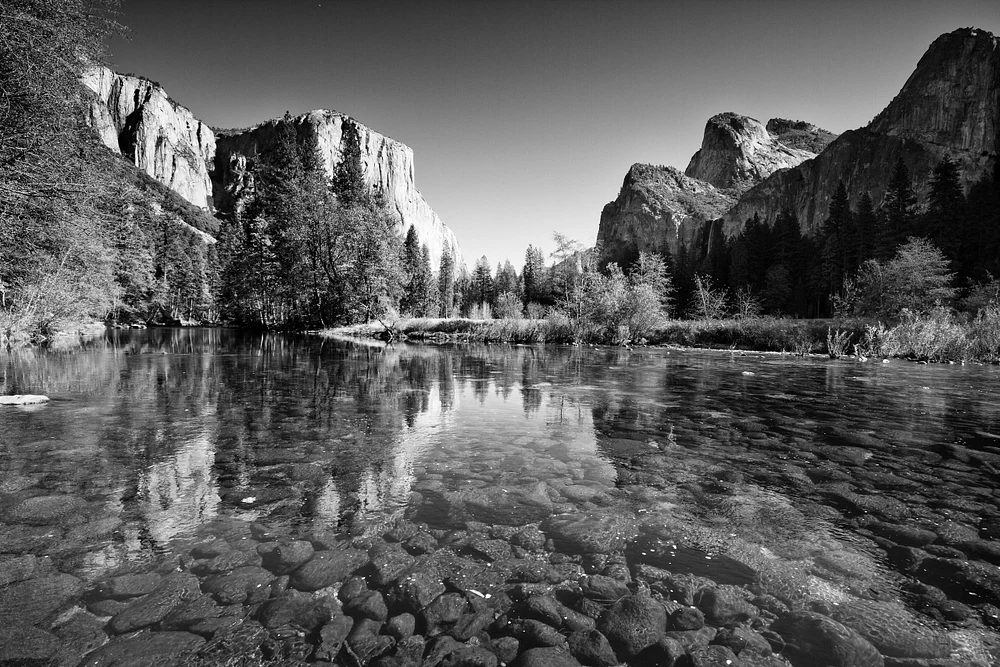 Reflections of Majestic Cliffs in Still Waters