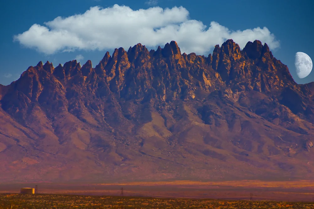Majestic Mountain Range Under Moonlit Sky
