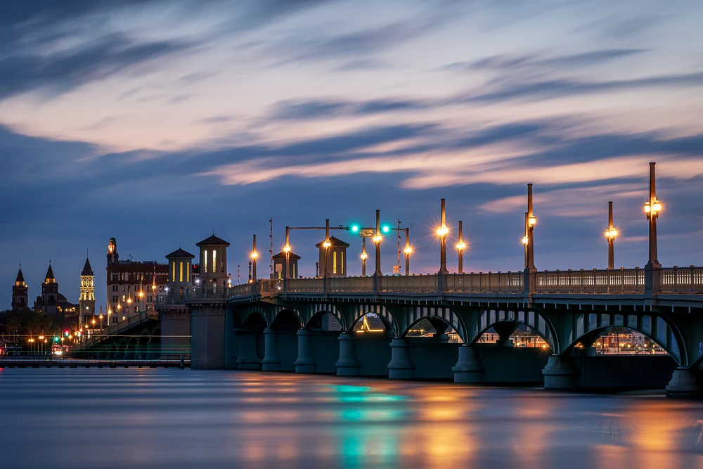 St. Augustine Bridge at Dusk with Illuminated Lanterns