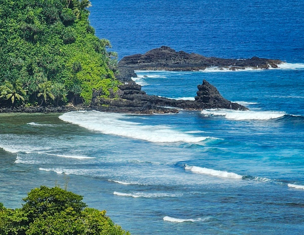 beach black rocks waves - American Samoa - ChristineGarbe