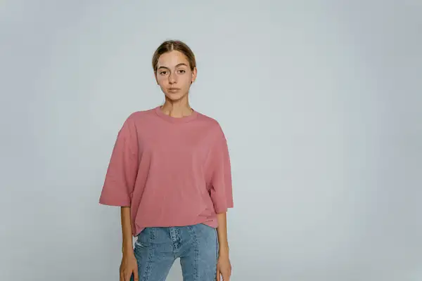Minimalist Casual Headshot Against Cool Gray Backdrop by...