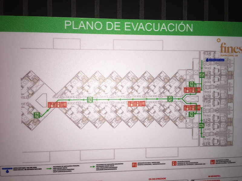 Evacuation map posted in room